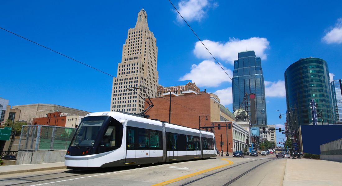 KC Street car with Kasnas City backdrop on sunny day