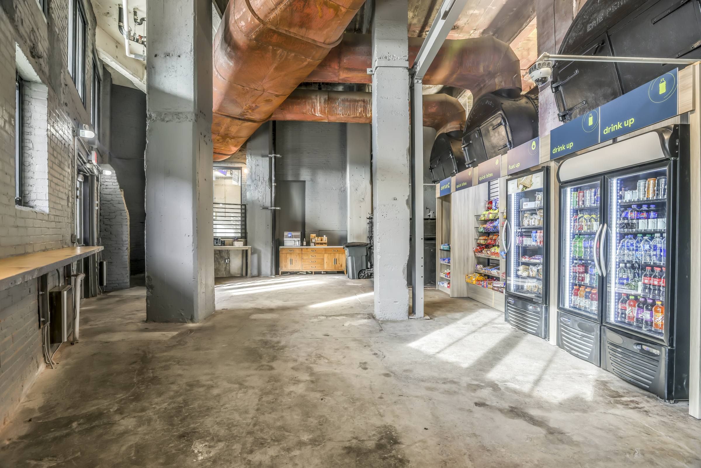 West Bottoms Flats Resident Market with historic building architecture and vending machines filled with snacks